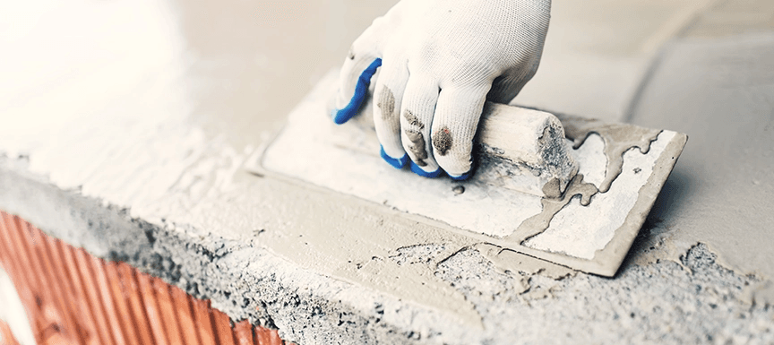 Cement waterproofing applied to a concrete surface